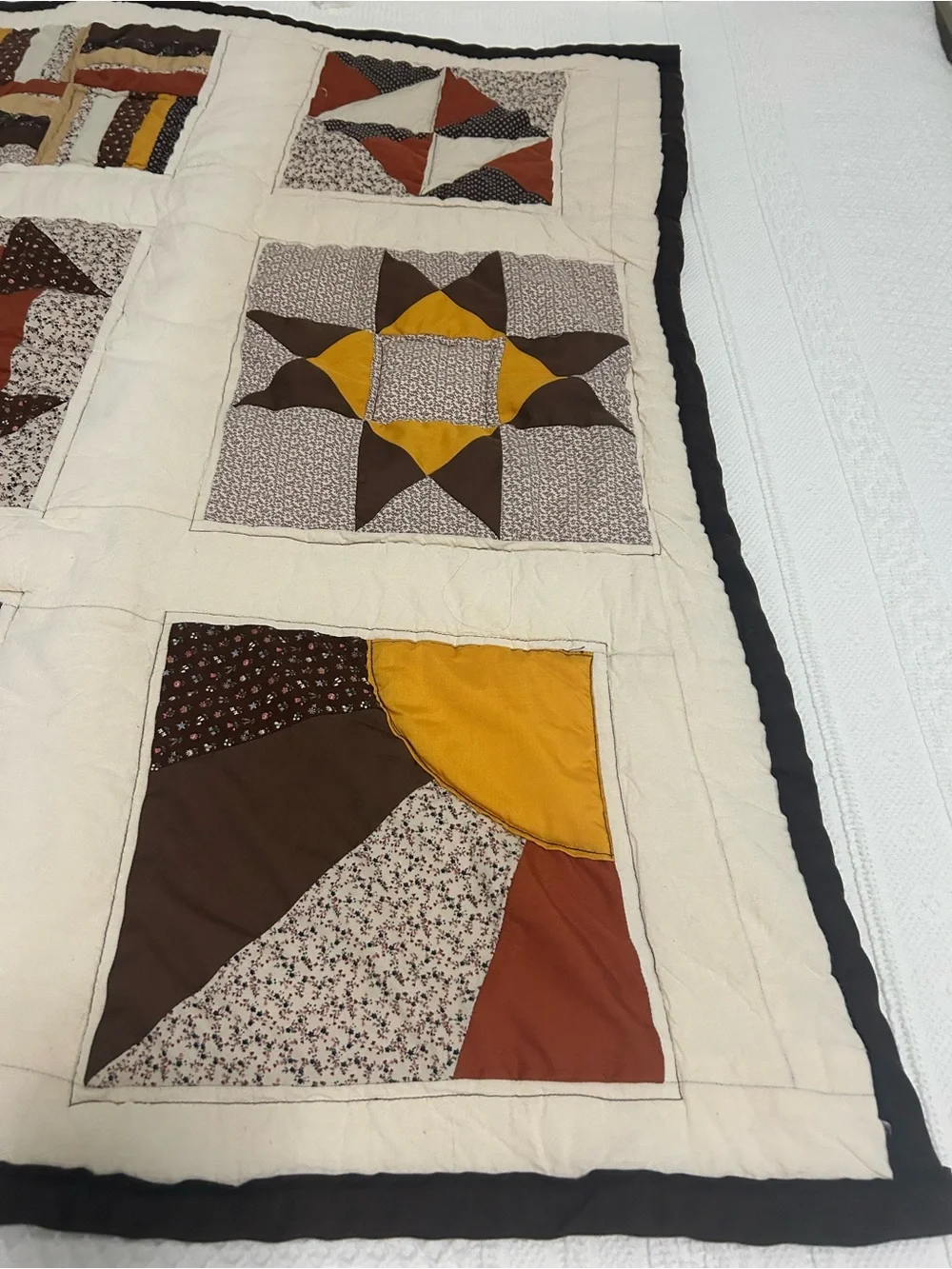Handmade Patchwork Crib Quilt. Cream with Brown, Rust and Mustard Accent